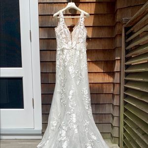Never worn or altered wedding dress!